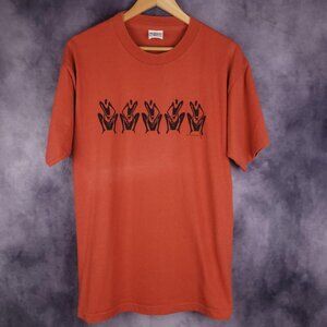 Vintage 90s Polynesian bongo drummers minimal abstract orange tiki shirt